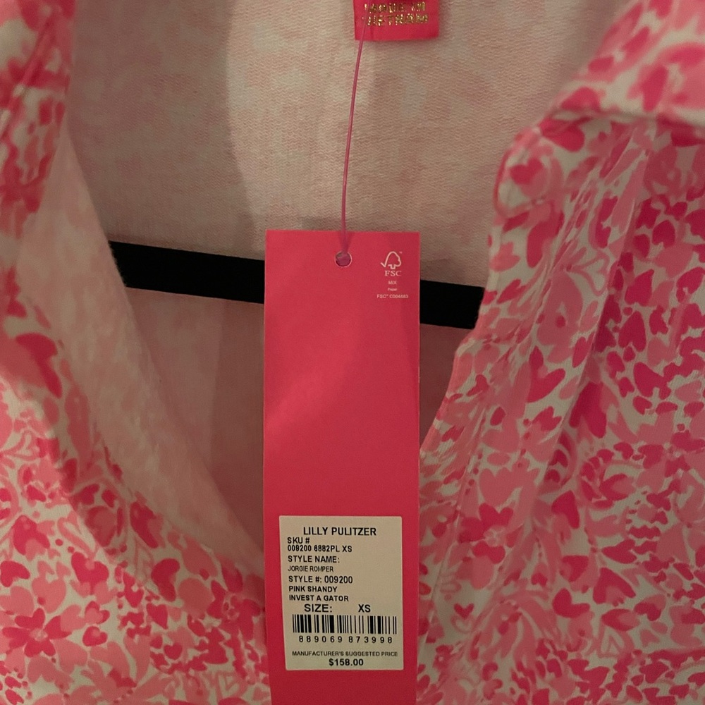Hot pink and white floral Lilly Pulitzer romper size XS.  NWT